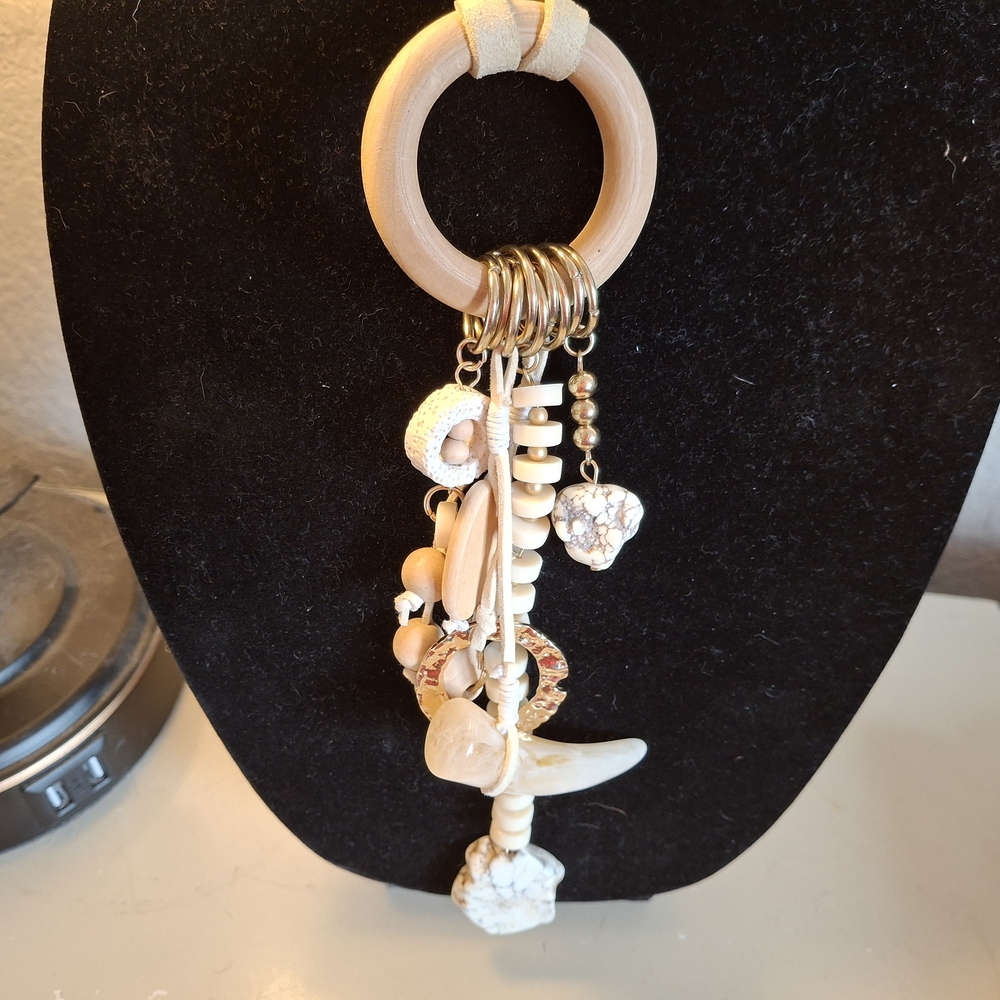 Elegant Cream and Gold Charm Necklace
